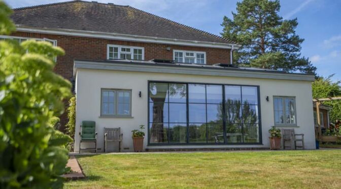 Slim Steel-look Sliding Door Installation in Effingham in Surrey